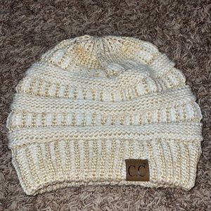 Never worn white and gold C.C Beanie that fits all